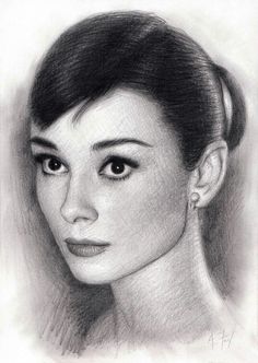 a pencil drawing of a woman's face with her hair in a bunt