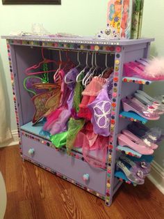 DIY dress up wardrobe could use for part hang up and part shelves in this I can see this working. Just need to find a dresser or something. Dress Up Wardrobe, Dress Up Stations, Shoe Organization Diy, Dress Up Storage, Princess Room, Toy Rooms, Diy Dress