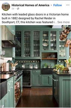 an image of a kitchen with green cabinets and black counter tops on instagrams