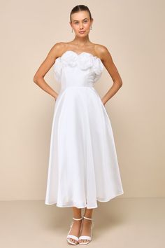 Head to your next event looking like a dream girl in the Lulus Idyllic Muse White Organza Rosette Strapless Midi Dress! This chic dress has a lightweight organza fabrication that shapes a strapless bodice with side boning and a straight neckline trimmed with bold rosette details (and hidden no-slip strips). High, fitted waist sits atop a twirl-worthy skater skirt that falls to a midi hem. Hidden back zipper/clasp. Midi Bridal Shower Dress, Mid Length Wedding Dress, Midi Homecoming Dresses, White Organza Dress, Shower Dress For Bride, Summer Graduation Dress, Short Bridal Gown, Midi Wedding Dress, Casual Formal Dresses