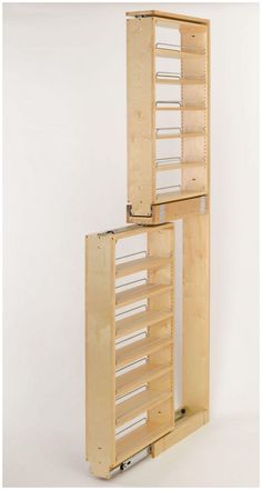 two wooden shelving units stacked on top of each other