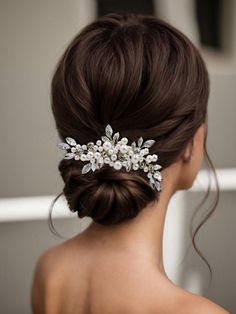 a woman wearing a bridal hair comb