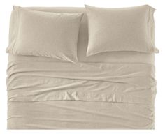 an image of a bed with two pillows and sheets on top of eachother