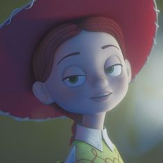 a cartoon character wearing a red hat with green eyes and an orange top on her head