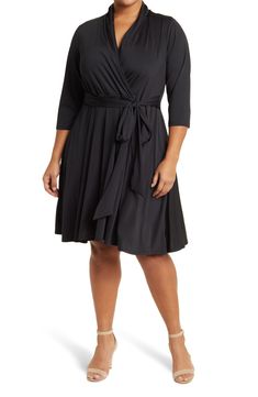 Slip into style with this 3/4 sleeved dress that is finished off with a tied waistline. 43" length (size 1X) Surplice neck 3/4 length sleeves Slips on over head 95% polyester, 5% spandex Machine wash Imported Model stats: 5'10" height, 32" bust, 25" waist, 36" hip. Model is wearing size 1X. Plus Size Dresses, Three Quarter Sleeve Dresses, Hourglass Shape, Daytime Dresses, Sleeved Dress, Nordstrom Dresses, Three Quarter Sleeves, Three Quarter, Sundress