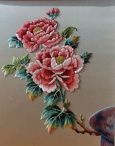 a painting of pink flowers with green leaves