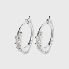 Bring sparkle and shine to your casual and dressed-up looks with these Women's Sterling Silver Cubic Zirconia Hoop Earring - Silver. Featuring the classic hoop design that hugs your earlobes perfectly, these silver-finished hoop earrings are designed with studded zirconia crystal accents that add the perfect touch of shine to your looks. Elegant and timeless, these earrings can be worn on their own for a sparkly flair or stacked with other stone-studded huggies for a more balanced ensemble. Gend Turkey Shopping, Cubic Zirconia Hoop Earrings, Candle Pedestal, Amazon Jewelry, Earring Silver, Hoop Design, Nickel Free Earrings, Tassel Drop Earrings, Hoop Earring Sets