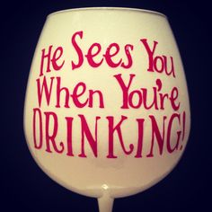 a wine glass with the words he sees you when you're drinking