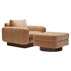 a chair and ottoman sitting next to each other
