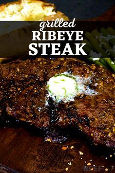 grilled ribeye steak with garlic bread and asparagus