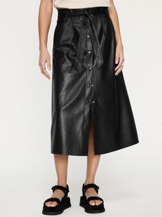 The ultimate vegan leather skirt, our Teagan Belted Skirt is the one you will want to wear every day. In a feminine, yet casual A-line silhouette, this midi skirt features a snap front, removable self-belt and a structured waistband with elasticated back for a touch of ease and tailoring. Leather Skirt, Belted Skirt, Vegan Leather Skirt, Skirt Belt, Summer Skirts, British Indian, Black Onyx, Midi Length, Vegan Leather