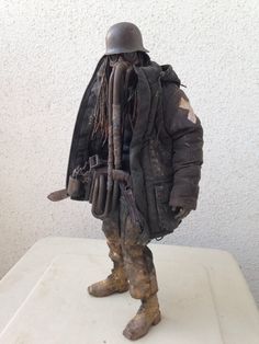 an old soldier is standing with his back pack