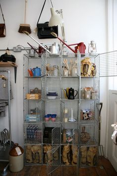 a metal shelf filled with lots of items