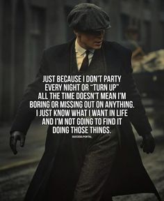 a man in a suit and hat walking down the street with a quote on it