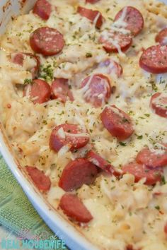 a pizza with pepperoni and cheese in a casserole dish on a table