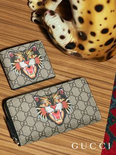 Up close with GG wallets from the Gucci Pre-Fall 2017 collection by Alessandro Michele, embellished by the Angry Cat print. Gucci Bags Handbags, Gucci Fanny Pack, Cheap Gucci, Gucci Clutch, Gucci Style, Gucci Crossbody Bag, Gucci Crossbody, Men's Wallets