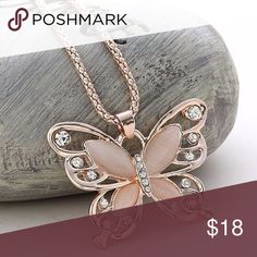 Gold over stainless steel butterfly Gold over stainless steel butterfly with Pearl like wings 28 inch chain peach color with rhinestones Jewelry Necklaces Butterfly Jewelry Necklace, Madam Butterfly, Rose Gold Butterfly, Horn Pendant Necklace, Moon Pendant Necklace, Butterfly Pendant Necklace, Swarovski Necklace, Long Chain Necklace, October Birthstone