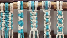 four different types of ropes hanging from a wooden pole, one is blue and the other is white