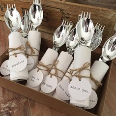 there are many forks and spoons in the box