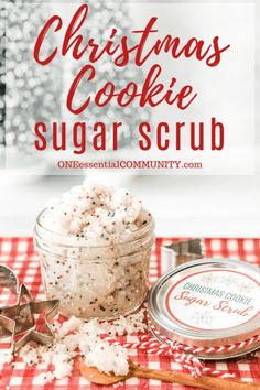 christmas cookie sugar scrub in a glass jar on a red and white checkered tablecloth