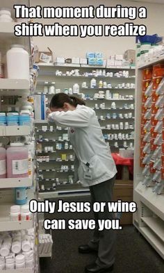 a man standing in front of a shelf filled with lots of bottles and cans, holding his head