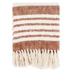 a brown and white blanket with fringes