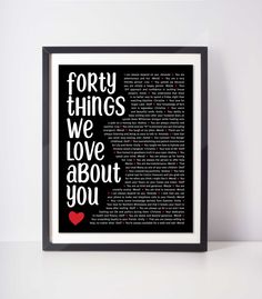 a framed book page with the words forty things we love about you in black and red