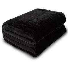 a black blanket folded on top of each other