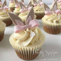 some cupcakes with bunny ears and bows on them are being viewed on instagram