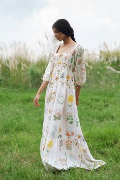 A dreamy tiered-dress made for floating around on summer days and basking in the sun. Made sustainably from hemp, it's soft and lightweight and features hand-embroidery on the top and printed botanicals on the skirt. It has a comfortable fit and is floor length. The model is 5'3 and is a size 6 (XS) and is wearing a small size in a customised long length (57") of the dress. Length tip: Our regular dress length is 54" which is ankle-floor length (depending on your height!). However we can make th Floaty Summer Dresses, Hemp Dress, Hemp Clothing, Sustainable Clothing Brands, Digital Print Fabric, Ethical Clothing, Sustainable Clothing, Tiered Dress, Fashion Labels