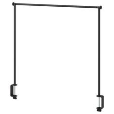 a black metal pole with two handles on each end and one arm extended to the side