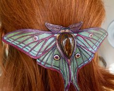 "This stylish tooled leather Spanish Luna moth hair barrette with pietersite gemstone would make a precious accessory for those who love touch of nature. Piece is ~5\" (~13cm) wide and uses the second biggest barrette blank. This particular moth was MADE TO ORDER but if you'd like to get similar or different type of a moth or butterfly (with different colours or size) I could customize something for you. You may choose a size of the actual hair barrette and size of the entire piece as well. All Fimo, Le Vent Se Leve, Luna Moth, Tooled Leather, Original Gift, Hair Barrettes