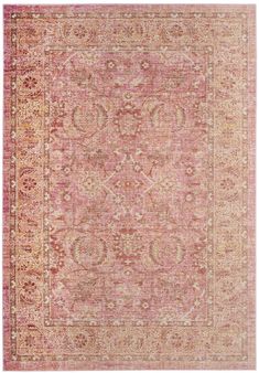 an antique rug with pink and orange colors on the ground, in front of a white background