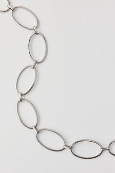 Minimal metal boho belt in delicate chain with an adjustable closure. Features Oval ring chain belt Delicate chain belt Oval ring links Adjustable fit Content + Care Mixed metal Wipe clean Imported Size + Fit S/M=37" L/XL=41" | Oval Ring Chain Belt in Silver, Women's at Urban Outfitters Boho Belt, Boho Belts, Ring Chain, Belt For Women, Oval Ring, Waist Chain, Oval Rings, Delicate Chain, Chain Belt