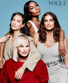 three women are posing together for the cover of a magazine, with one woman leaning on her shoulder
