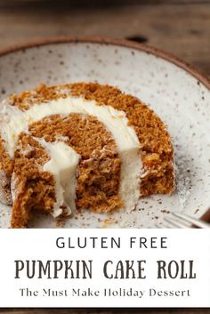 a piece of pumpkin cake roll on a plate with the words gluten free pumpkin cake roll