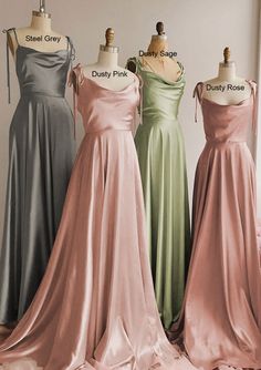 three dresses on mannequins in different colors and sizes, one is pink, the other is green