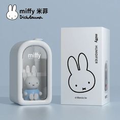 a white box with an image of a rabbit in it next to a packaging for miffy