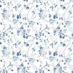 a blue and white floral wallpaper with small flowers on the bottom half of it