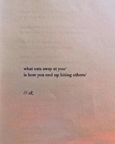 an old typewriter with the words what eats away at you is how you end up biting others