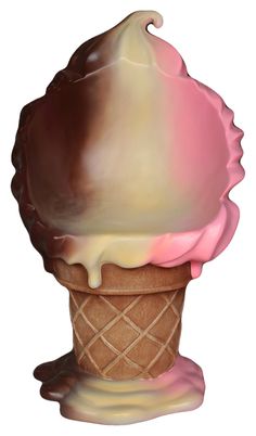 an ice cream sundae with pink and white icing on it's cone