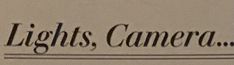 the words lights, camera are written in black ink