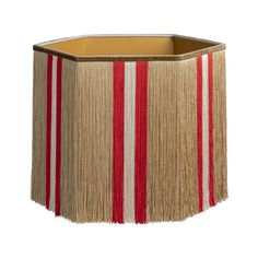 a lamp shade with red and white stripes