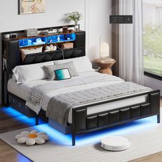 a bedroom with a bed, night stand and blue light under the bed headboard