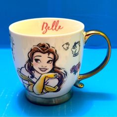 a coffee cup with an image of princess on it