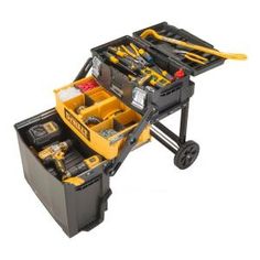 a tool box filled with tools on top of a table