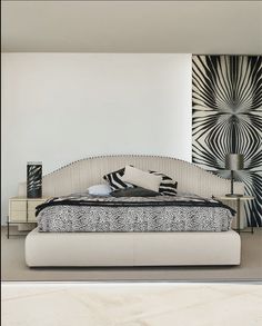 a modern bedroom with white and black decor