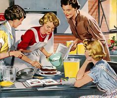 three women in aprons are preparing food together