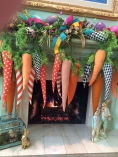 a fireplace decorated with carrots and streamers
