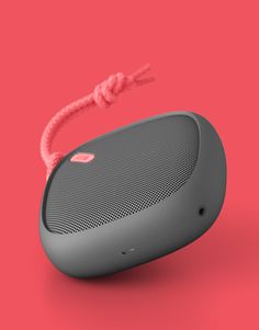 the new jbl boom portable bluetooth speaker is shown in front of a pink background